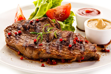 Grilled steaks and vegetables