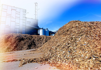 bio power plant drawing  with storage of wooden fuel against blue sky