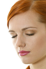 Fototapeta premium Serious, thoughtful young woman with closed eyes