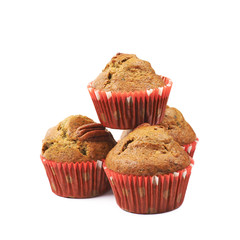 Pile of pecan nut cupcakes isolated