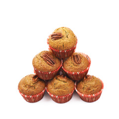 Pile of pecan nut cupcakes isolated