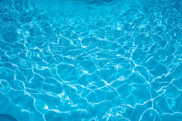 Obraz premium Blue water surface and ripple wave in pool