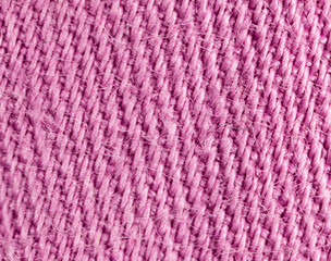 pink fabric as a background. macro