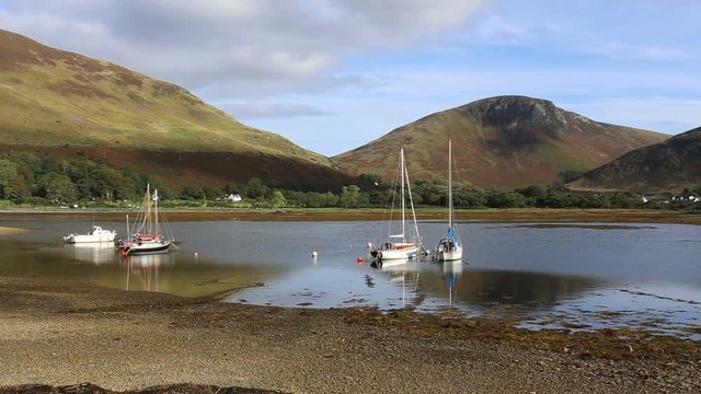 Peak of Torr Nead an Eoin and sailing boats in Loch Ranza, Lochranza Isle of Arran Scotland

