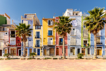 Colorful homes in Mediterranean village of Villajoyosa - obrazy, fototapety, plakaty