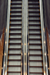 Escalator from the above in airport in Russia. Working elevator top view