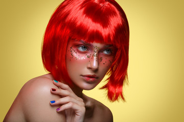 Beautiful girl in red wig