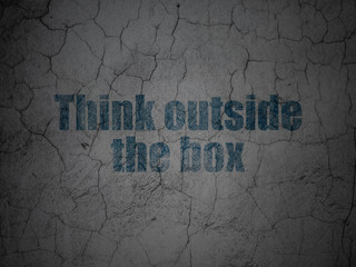 Learning concept: Think outside The box on grunge wall background