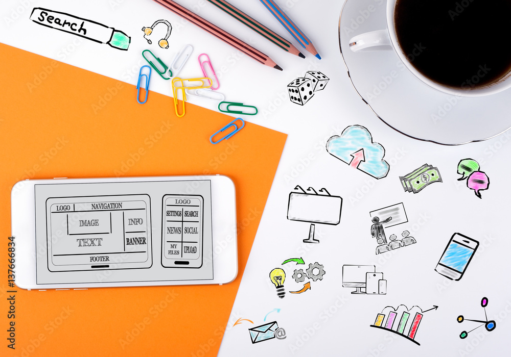 Canvas Prints website and mobile app development concept. mobile phone and coffee cup on a white office desk.
