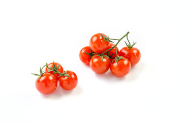 Brunch of cherry tomatoes isolated on a white background