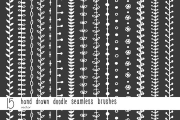 Set of hand drawn doodle seamless decorative brushes for dividers, borders, ornaments, frames, borders and design elements isolated on black background. Vector brushes are included in the brush panel.