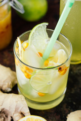 Cold ginger lemonade with lime and lemon.