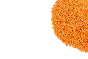 Red lentils on white background