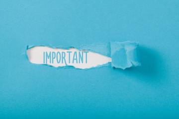 Important message on paper torn ripped opening - obrazy, fototapety, plakaty