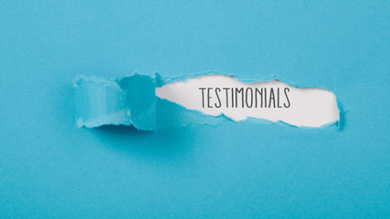 Testimonials message on Paper torn ripped opening