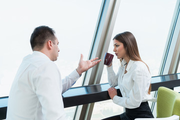 business couple working together on project at modern startup office