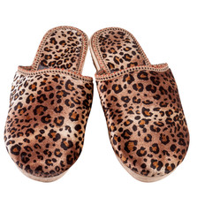female domestic leopard slippers isolated on white background