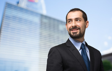 Fototapeta premium Handsome businessman portrait outdoor