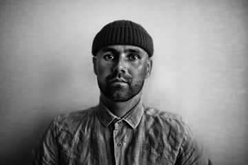 Black and white portrait of a sad man