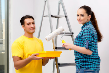 Wife and husband family doing home improvements