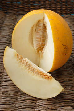 Ripe melon on wicker background