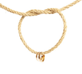 Two golden rings is hanging on the rope