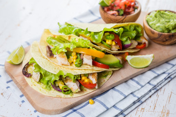Mexican food - tacos, salsa, guacamole