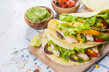 Mexican food - tacos, salsa, guacamole