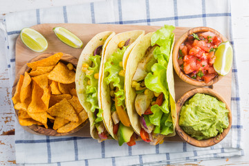 Mexican food - tacos, salsa, guacamole