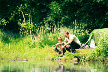 Camping Family Having Fun Outdoors