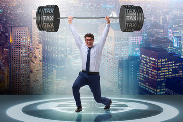Businessman under  heavy burden of taxes