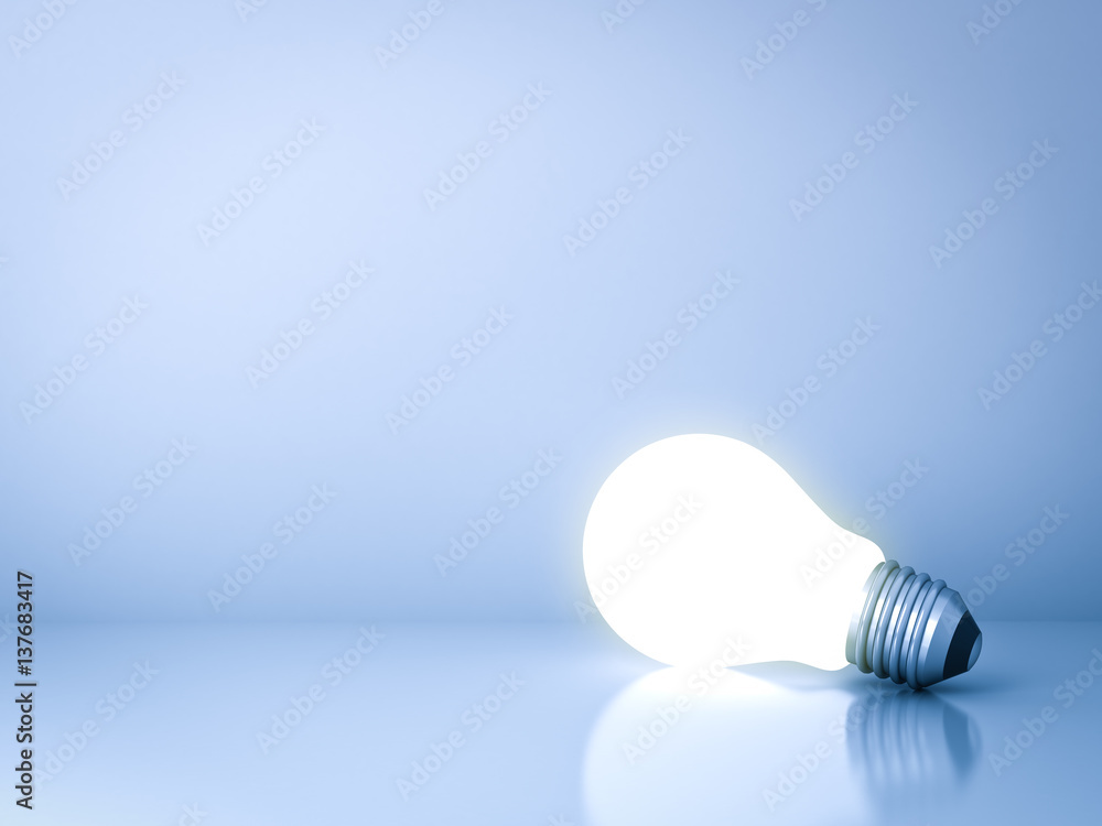 Poster blank creative idea background concept with one glowing idea light bulb on blue wall background with