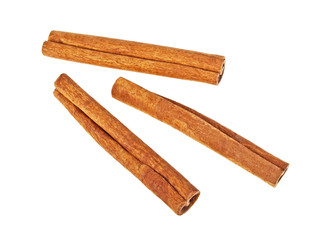 Cinnamon sticks on white background, top view