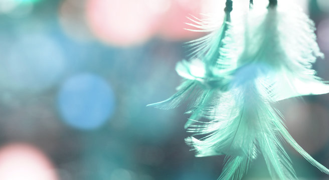 Dream Catcher And Bright Light With Blurred Focus For Background