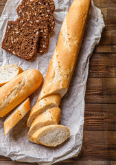 White ,dark bread on paper