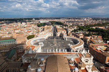 Fototapeta premium Famous Saint Peter's Square in Vatican, aerial view of the city Rome, Italy.