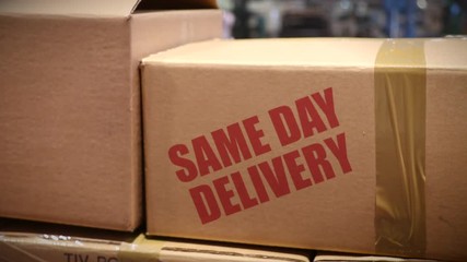 Same day delivery cartons at logistics center