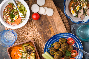 Vegetable salads, falafel on the table