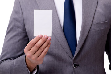 Businessman with blank card isolated on white background
