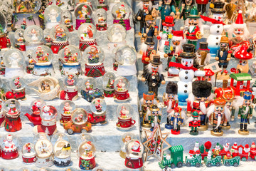 Christmas stall with snow balls and several puppets