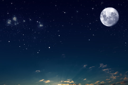 background night sky with stars, moon and clouds. Elements of this image furnished by NASA