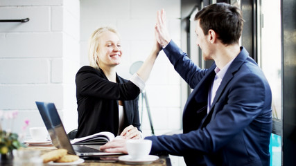Business People are Looking at a Screen and Make a Deal