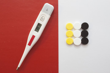 thermometer and pills