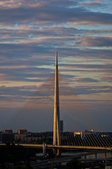 Fototapeta na wymiar Cable bridge at sunset with colorful cloudscape in background, Belgrade, Serbia