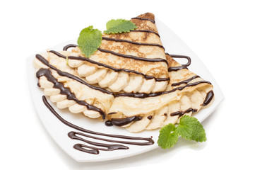 Crepes with bananas and cream