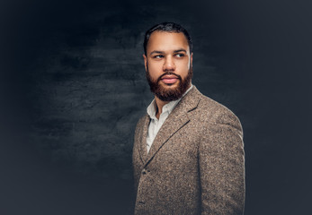  Black male dressed in a suit from a wool.