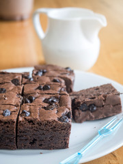 Cake chocolate brownies with fresh milk