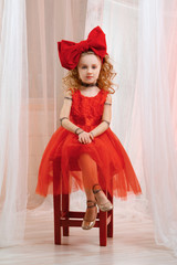 Cute girl in puppet look body paint. Young lady acts as a doll.