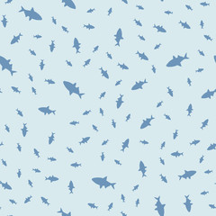 Seamless pattern of fish in different sizes, floating in a chaotic manner. Vector illustration.