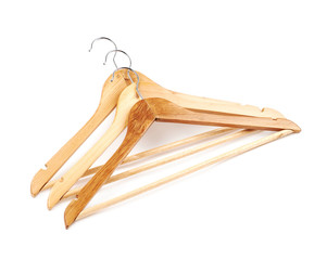 Pile of light wooden hangers